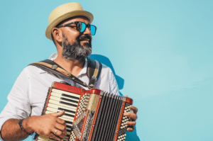 gefen_23233_a_man_playing_on_an_accordion_with_a_blank_bright_b_73688a3e-b251-48f5-b2ab-9aad37ff931e-2